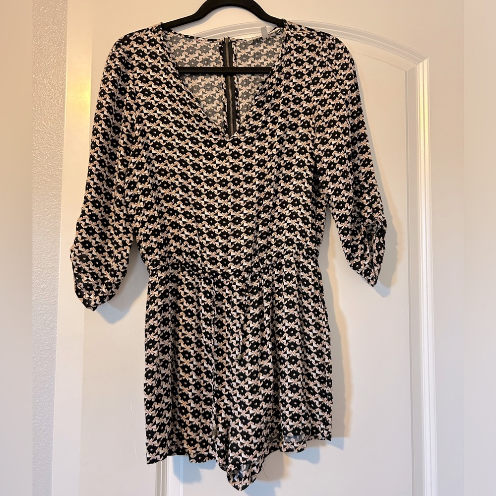 Orange and black romper